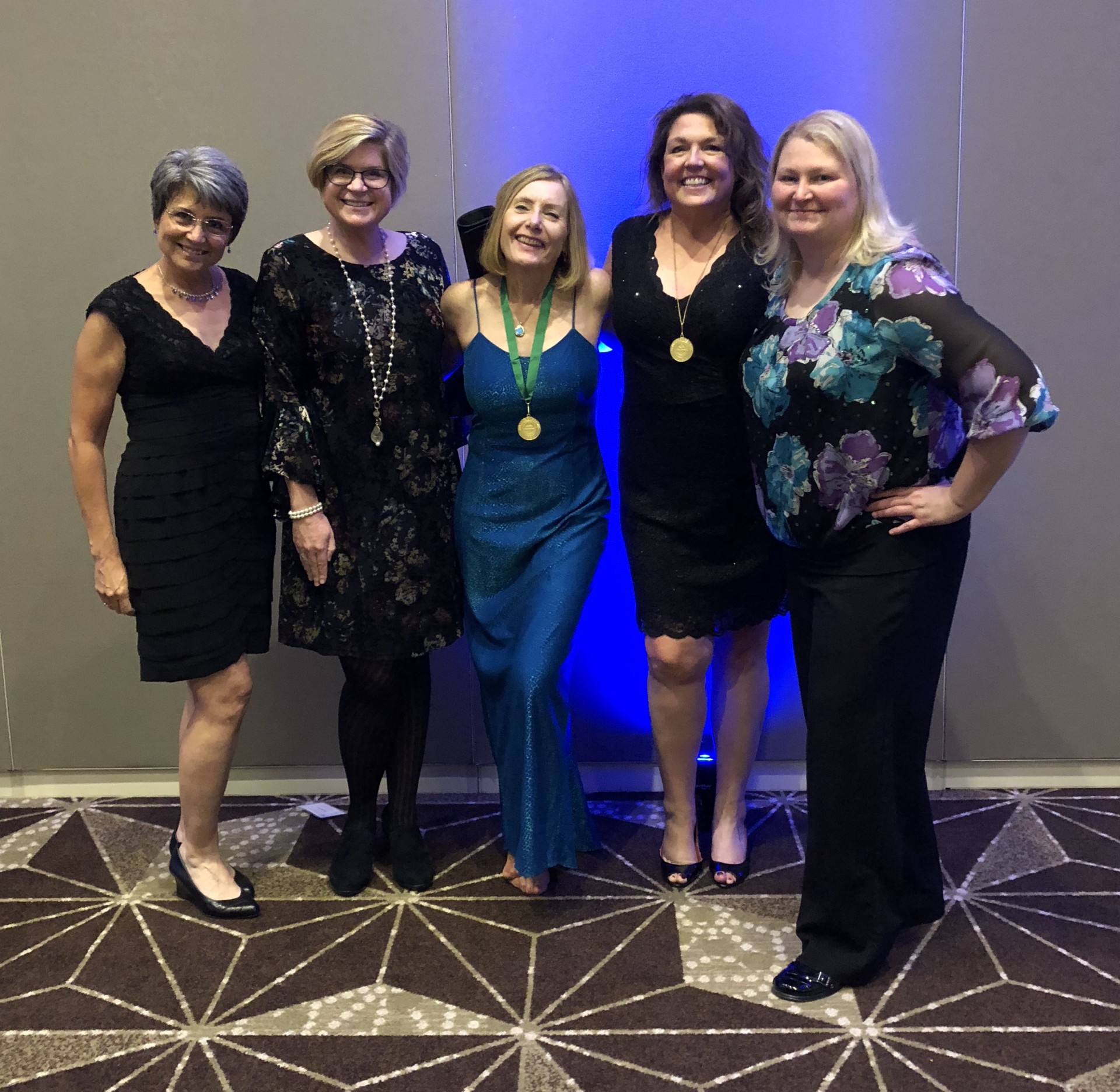 Members of PRSA Puget Sound with the author (center) at her induction into the College of Fellow.